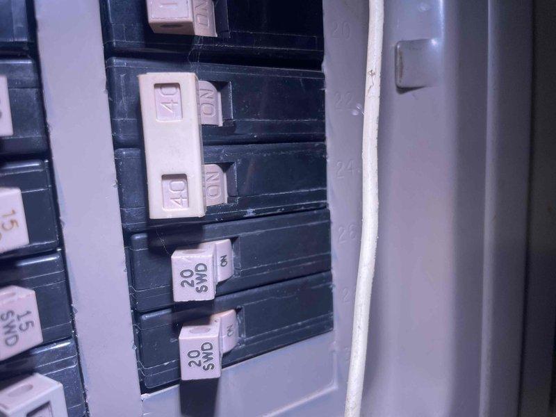 Provided comprehensive HVAC estimate for complete system replacement of 20+ year old non-operational natural gas forced air furnace and air conditioning system in colonial residence. Documented existing electrical panel configuration and utility room conditions, including water heater placement and plumbing infrastructure, to assess installation requirements and ensure proper system integration with home's existing electrical and mechanical systems.