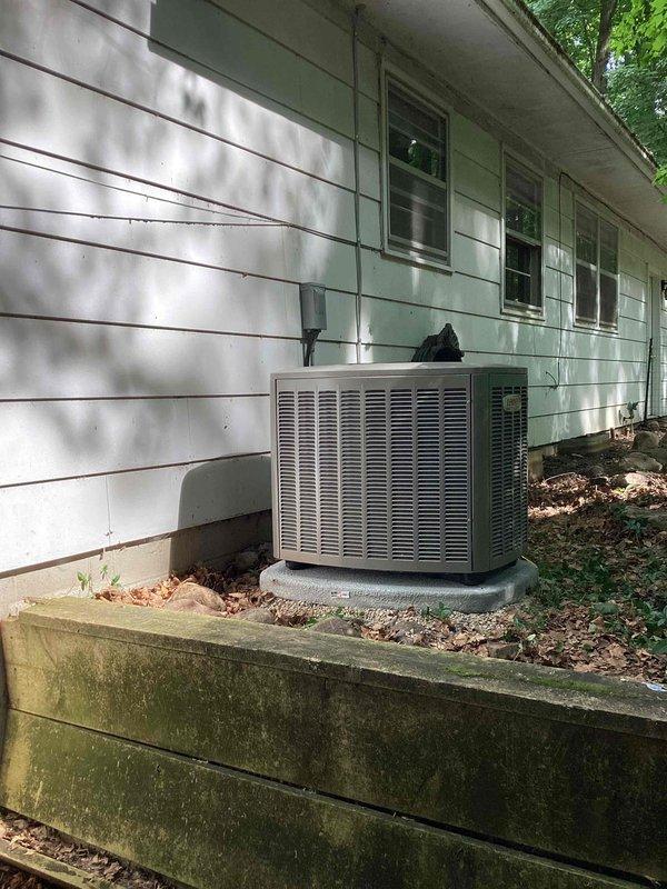 Completed installation of 2.5-ton air conditioning system with matching evaporator coil at rear of residence. Installed new dedicated electrical circuit with appropriate disconnect and conduit routing, secured mechanical and electrical permits prior to installation. Positioned outdoor condensing unit on concrete pad with proper clearances, completed all refrigerant line sets and electrical connections per manufacturer specifications, and verified system operation and performance upon startup.