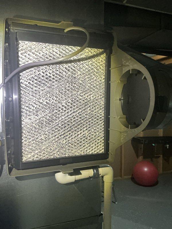 Performed annual cooling maintenance on HVAC system. Upon inspection, discovered evaporator coil completely frozen with heavy ice buildup across entire surface, indicating restricted airflow or low refrigerant charge. Identified cause as severely restricted airflow due to dirty/clogged filter media. Shut down system to allow coil to thaw completely. Replaced furnace filter as requested. Inspected condensate drain system and PVC drain lines for proper operation. Checked refrigerant lines, service valves, and brass fittings for leaks or damage. Once coil thawed, verified drain pan functionality and cleared any residual moisture. Reinstalled access panel and restored system to normal operation. Advised monitoring system performance to ensure ice buildup does not recur. System operating within normal parameters upon departure.