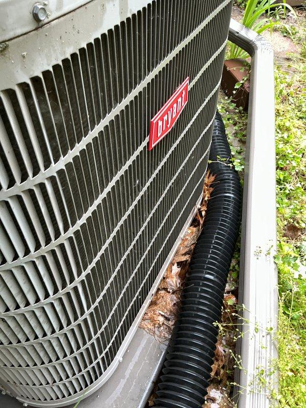 Completed annual cooling maintenance on Bryant outdoor condenser unit. Performed system inspection, cleaned debris and organic matter from base and surrounding area, replaced air filter, and verified proper operation of all components. Unit tested and left in good working condition.