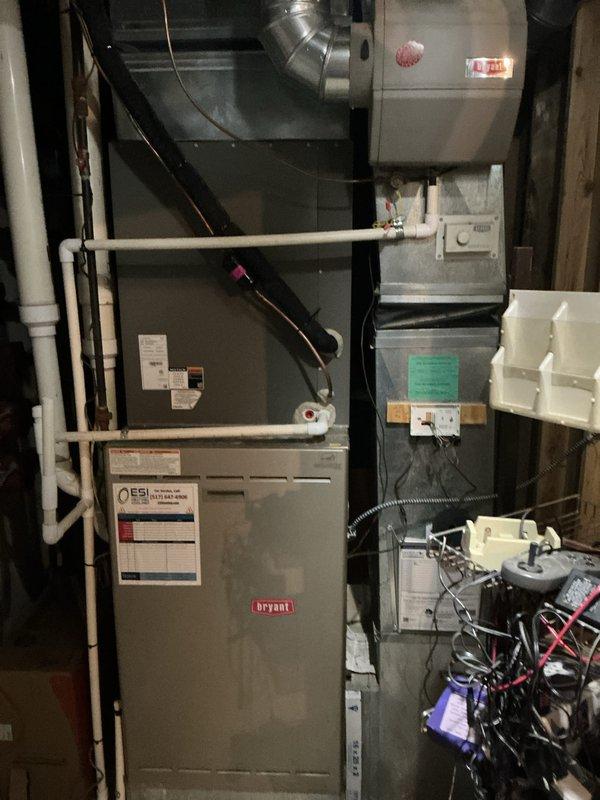 Completed routine Air Care Cooling maintenance visit on recently installed Bryant HVAC system. Performed comprehensive inspection of furnace, air handler, evaporator coil, and refrigerant lines, documenting equipment condition with photos showing proper installation and normal operational status. All components functioning within manufacturer specifications with no issues identified during this preventive maintenance check.