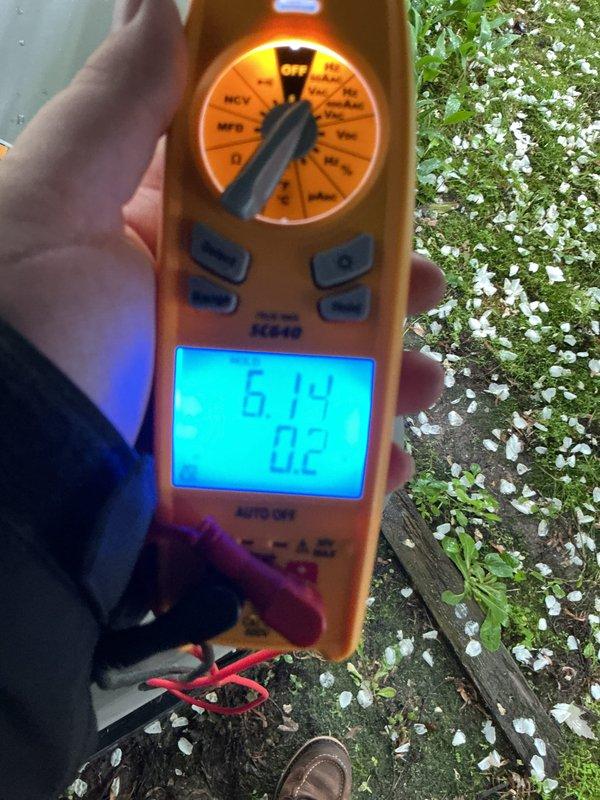 Completed scheduled ACM maintenance on residential air conditioning unit, including inspection of condenser coils which showed accumulated debris and dust on mesh screening and metal fins. Performed system diagnostics with multimeter, recording voltage and amperage readings to verify proper electrical operation and compressor function.
