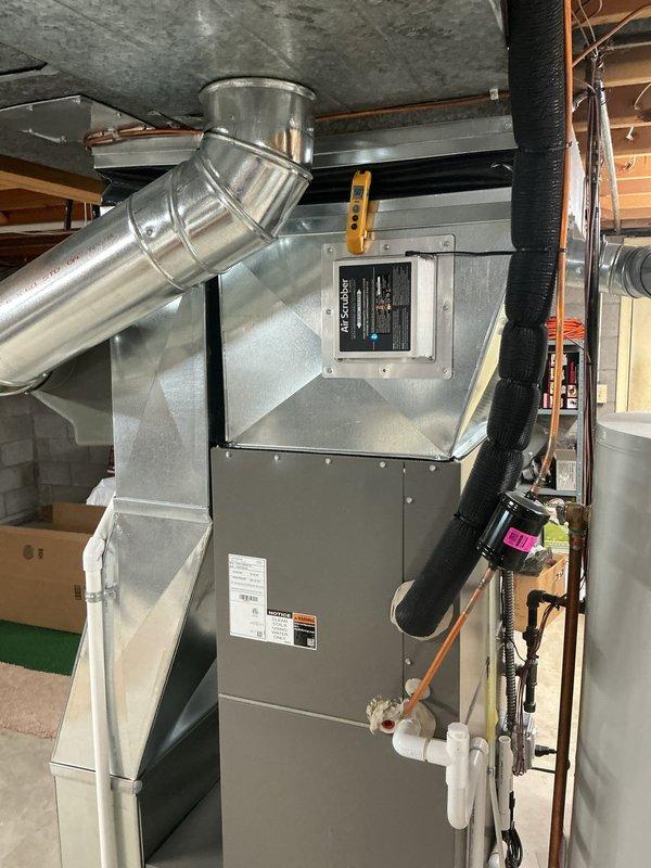 Completed annual cooling maintenance on residential HVAC system. Replaced air filter and evaporator pad as scheduled, inspected refrigerant lines and connections for leaks, verified proper operation of all system components including blower assembly and ductwork connections.