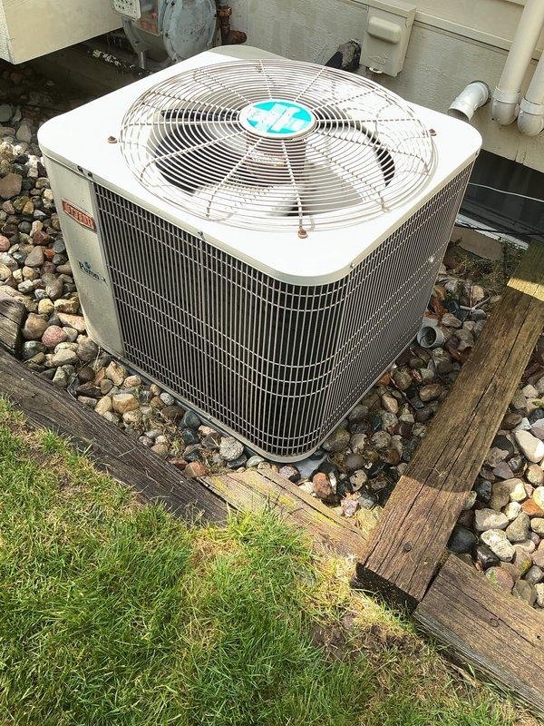 Completed annual cooling maintenance on Bryant residential condensing unit. Performed comprehensive inspection of outdoor unit including fan motor operation, refrigerant line connections, electrical components, and condenser coil condition. Verified proper airflow through protective wire guard and cleaned debris from surrounding area. Unit operating within normal parameters with no deficiencies noted during routine ACM service.