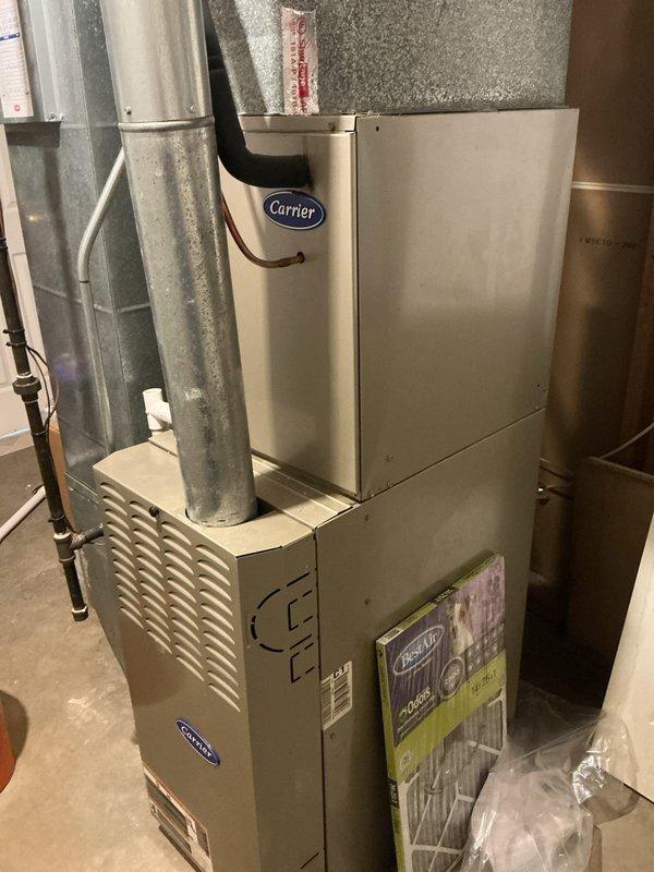 Completed annual cooling maintenance on residential HVAC system consisting of Carrier air handler and furnace unit. Performed comprehensive inspection of all components, checked refrigerant levels, cleaned coils, verified proper airflow through ductwork, tested electrical connections, and replaced air filter. System operating within manufacturer specifications with no issues identified.