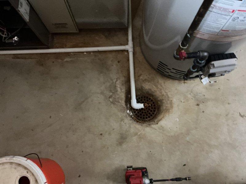 Completed full installation of 2.5-ton air conditioning system with matching evaporator coil in basement utility area. System was installed with rear discharge configuration and reconnected to existing ductwork and electrical service. All necessary mechanical and AC permits were obtained prior to installation, and unit was tested for proper operation upon completion.