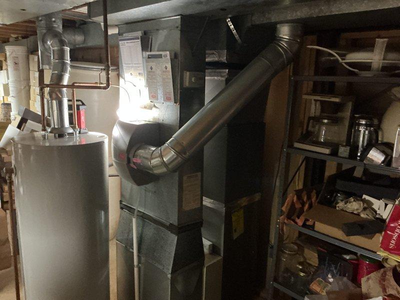 Completed full installation of 2.5-ton air conditioning system with matching evaporator coil in basement utility area. System was installed with rear discharge configuration and reconnected to existing ductwork and electrical service. All necessary mechanical and AC permits were obtained prior to installation, and unit was tested for proper operation upon completion.