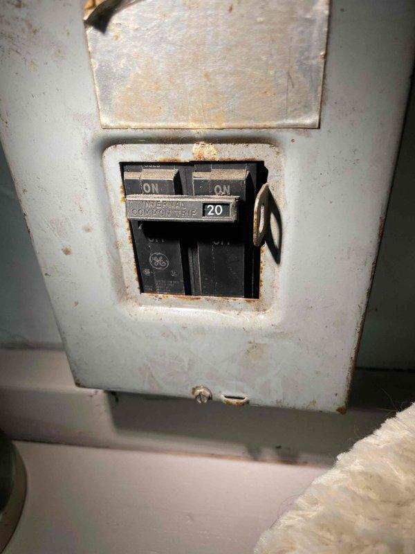 Conducted on-site evaluation for new mini split system installation in residential bedroom. Assessed interior space requirements, wall mounting location for indoor air handler unit, and existing electrical infrastructure including 20-amp GE circuit breaker panel showing signs of aging and surface corrosion. Documented room layout, clearances, and electrical service capacity to develop comprehensive installation proposal for ductless heat pump system scheduled for future installation.