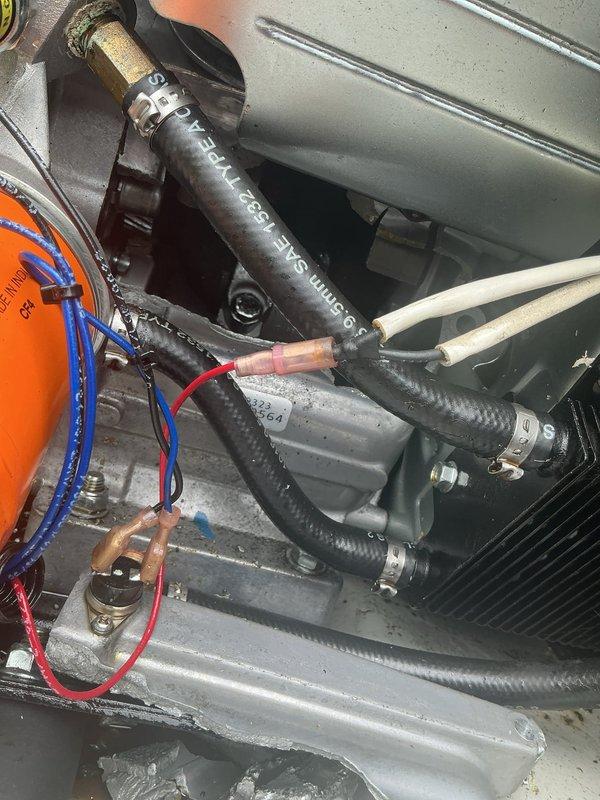 Performed diagnostic evaluation on 18KW Generac generator with reported engine failure. Upon inspection, confirmed catastrophic engine damage requiring complete engine replacement. Documented internal component condition with photographs showing compromised mechanical assembly, hose connections, and associated hardware for warranty and repair assessment purposes.