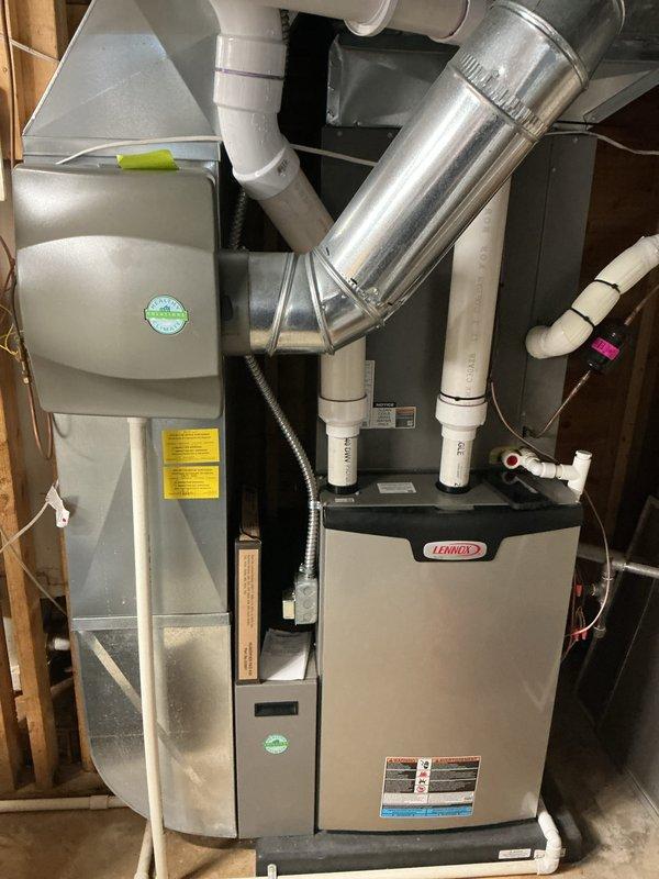Completed annual cooling maintenance on Lennox HVAC system. Performed comprehensive inspection of furnace, air handler, and associated ductwork, verifying proper operation of all components. Checked condensate drain lines, PVC venting system, and flexible connections for proper installation and function, documented equipment condition with photos, and confirmed system is operating within manufacturer specifications.