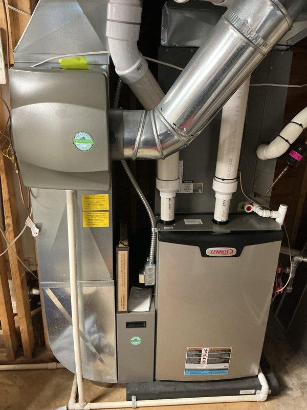 Completed annual cooling maintenance on Lennox HVAC system. Performed comprehensive inspection of furnace, air handler, and associated ductwork, verifying proper operation of all components. Checked condensate drain lines, PVC venting system, and flexible connections for proper installation and function, documented equipment condition with photos, and confirmed system is operating within manufacturer specifications.