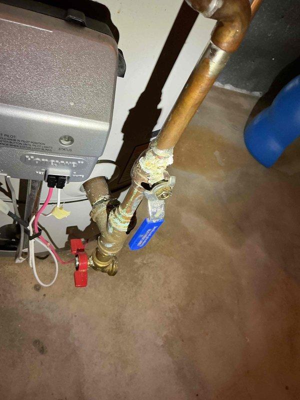 Completed scheduled Air Care Maintenance (ACM) service including system inspection, filter replacement, and photographic documentation of mechanical equipment and plumbing connections in utility area. All HVAC components inspected and found operational with routine maintenance tasks performed according to recurring service protocol.