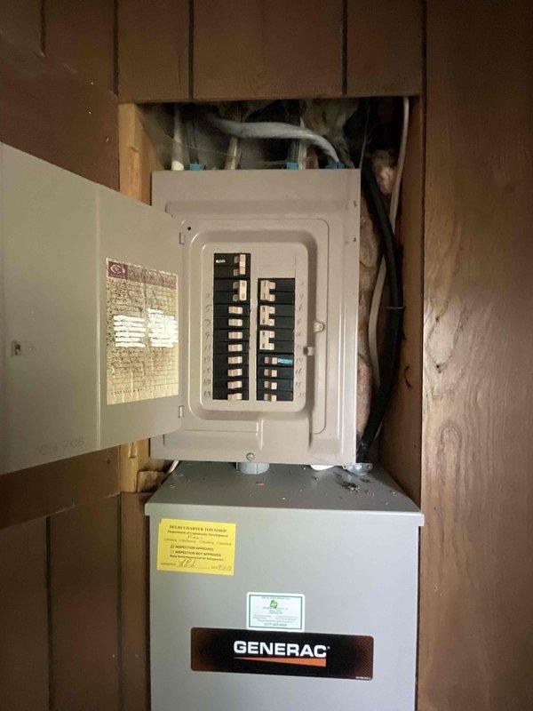 Responded to cooling failure complaint on 14-year-old air conditioning system that had received 3 lbs of refrigerant charge from another contractor one month prior with no lasting improvement. Performed comprehensive diagnostic evaluation to provide second opinion after previous company deemed system unrepairable. Assessed outdoor condensing unit, indoor evaporator coil, refrigerant circuit integrity, and overall system performance. Documented existing equipment configuration including Gibson furnace, electrical panel with Generac transfer switch integration, and complete HVAC installation in basement utility area. Provided full system replacement estimate based on findings and system age.