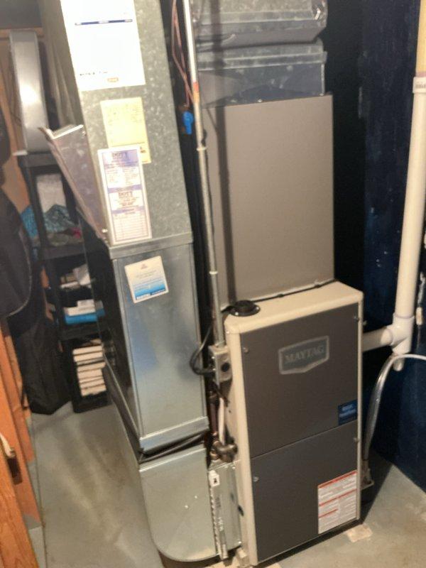 Completed annual comprehensive maintenance on residential HVAC system, including inspection of gas furnace, air handler, and Bradford White Defender water heater. Performed standard maintenance procedures on all equipment, verified proper operation of gas controls and ignition systems, inspected ductwork connections and plenum assemblies, and documented equipment conditions with photographic records. All systems tested and found operating within normal parameters.