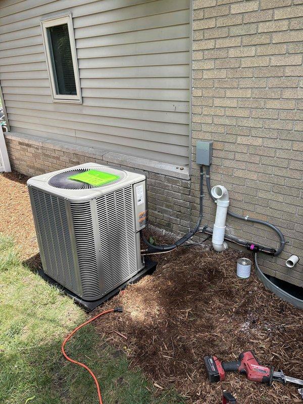 Completed full HVAC system installation including a 90,000 BTU furnace with air handler and 3-ton air conditioning unit with left-side configuration. Installed outdoor condensing unit on concrete pad with proper refrigerant line connections, electrical hookup, and PVC condensate drainage system. Mounted indoor air handler in basement with condensate pump, integrated humidifier, and reconnected all necessary ductwork and electrical components to ensure proper system operation.
