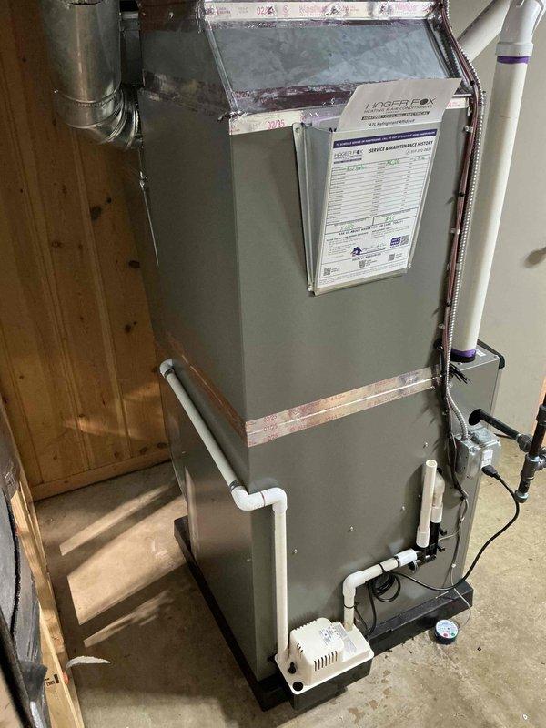 Completed full HVAC system installation including a 90,000 BTU furnace with air handler and 3-ton air conditioning unit with left-side configuration. Installed outdoor condensing unit on concrete pad with proper refrigerant line connections, electrical hookup, and PVC condensate drainage system. Mounted indoor air handler in basement with condensate pump, integrated humidifier, and reconnected all necessary ductwork and electrical components to ensure proper system operation.