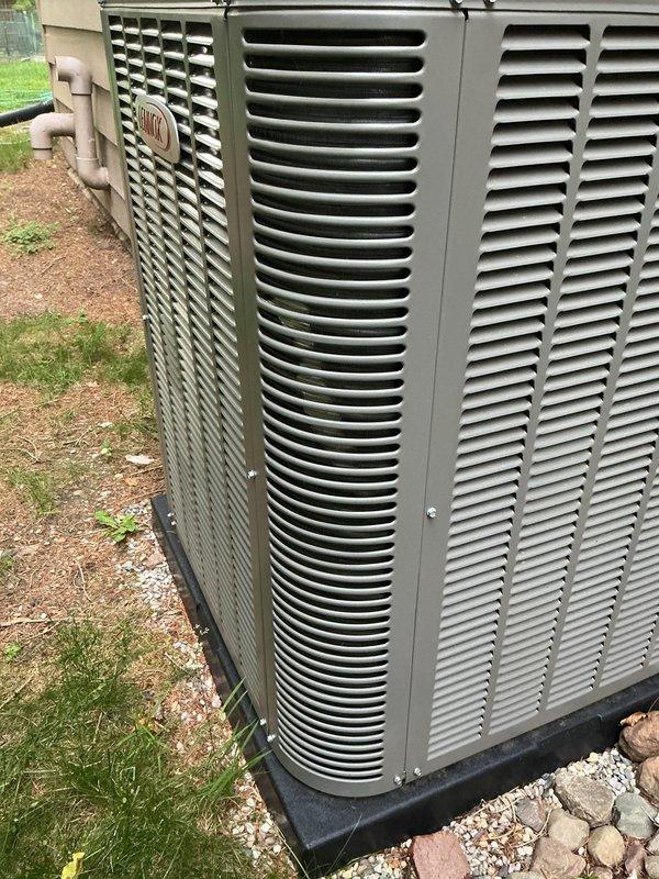 Responded to service call for non-operational condenser fan on 9-month-old Lennox air conditioning unit resulting in no cooling. Upon arrival, diagnosed condenser fan motor failure and replaced defective component under parts and labor warranty. Verified proper fan operation, tested system performance, and confirmed unit returned to normal cooling operation.