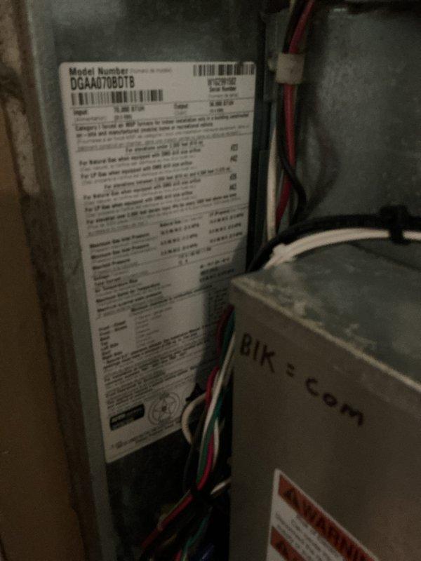 Completed scheduled air conditioning maintenance on DGAA070BDTB unit located in mechanical room. Performed comprehensive system inspection, verified thermostat operation displaying 71°F, checked all electrical connections and wiring, and documented equipment condition with photos for service records.