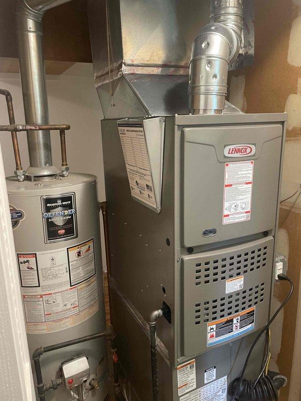 Completed full HVAC system installation including a Lennox 70,000 BTU furnace and 2-ton air conditioning unit with right-side placement. Installed new Sensi programmable thermostat, ran new electrical circuit to support equipment, and connected all ductwork and refrigerant lines. All mechanical and electrical permits were obtained prior to installation, system was tested and confirmed operational upon completion.