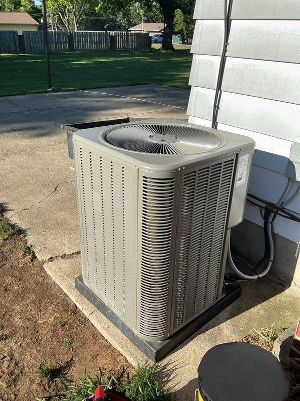 Responded to cooling complaint on 2023 system located in basement. Upon arrival, performed diagnostic inspection of outdoor condenser unit and indoor components. System was found to be operating with reduced capacity due to refrigerant charge issue. Verified proper airflow across condenser coils, checked electrical connections, and tested compressor operation. Adjusted refrigerant levels to manufacturer specifications, confirmed proper system pressures, and restored unit to full cooling capacity. System tested and operating normally upon departure, with both parts and labor covered under warranty.