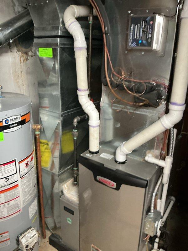 Performed comprehensive AC tune-up and routine maintenance on residential cooling system. Completed full system inspection of air handler unit, verified proper operation of all components, inspected and confirmed clean condition of air filter with intact mesh screen, checked refrigerant lines and PVC condensate drainage system for proper connections, and documented equipment condition through photographic records. All components found to be functioning properly with no issues identified or repairs required.