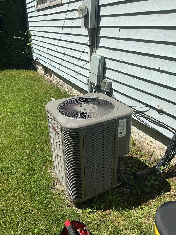 Responded to warranty service call for loud rattling noise from 4-year-old Lennox air conditioning unit (Model 13ACXN030-230-26, Serial 1921J40554). Inspected outdoor condensing unit and verified all mounting hardware, fan assembly, and internal components. Found loose debris in fan housing causing intermittent rattling sound during operation. Removed foreign material, secured all fasteners, and tested unit through complete cooling cycle. System operating normally with no abnormal sounds detected. All electrical connections verified secure, refrigerant levels within specification, and unit performing to manufacturer standards under parts and labor warranty coverage.