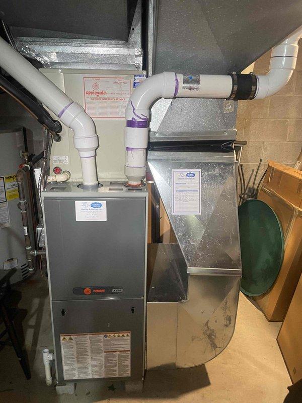 Provided estimate for air conditioning system replacement in basement location. Current 35-year-old unit is operational but has reached end of expected service life. Assessed existing HVAC infrastructure including Trane furnace, ductwork configuration, and mechanical room layout to determine replacement specifications and installation requirements.