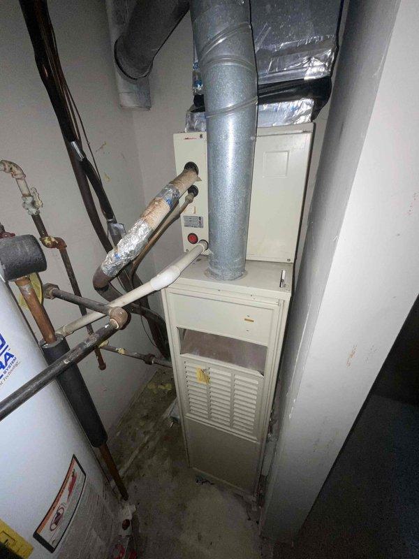 Conducted comprehensive equipment assessment for 288-unit residential complex to provide full system replacement estimate. Evaluated existing HVAC and water heating equipment originally installed in 1988, including furnaces, air conditioning units, and water heaters located in utility closets throughout the property. Documented current equipment conditions through photographic survey, noting 38-year-old systems with typical age-related wear on piping, ductwork, and mechanical components, though no immediate operational failures were reported at time of inspection.