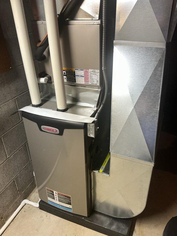 Completed annual cooling maintenance on Lennox HVAC system. Inspected evaporator coil assembly, verified copper refrigerant lines and U-bend connections are secure and free of corrosion, checked condensate drain pan for proper operation, and examined aluminum fin condition. All components functioning within normal parameters; unit operational and ready for cooling season.