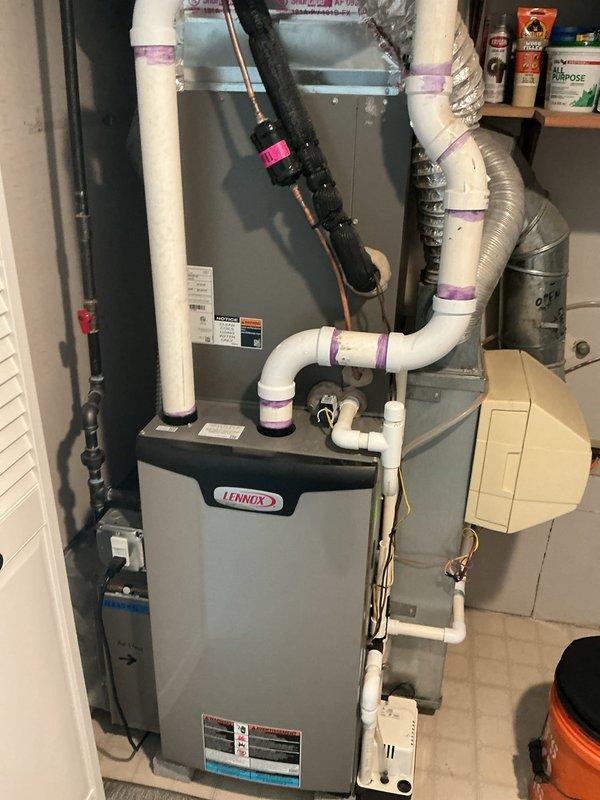Completed annual AC tune-up and maintenance on 2-year-old Lennox furnace system. Performed comprehensive inspection of all mechanical and electrical components including gas valve assembly, pressure switches, circuit board, capacitor, and wiring connections. Verified proper operation of ventilation system, condensate drainage lines, and refrigerant lines; system operating within normal parameters with no issues identified.