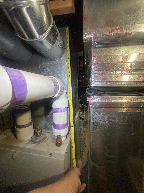 Conducted on-site evaluation of existing 20-year-old air conditioning system for replacement estimate. Assessed current HVAC equipment including air handler unit, refrigerant lines, and condensate drainage system in mechanical room. Performed dimensional measurements of existing equipment and available space to determine proper sizing requirements for new system installation. Documented current system configuration including PVC condensate piping, copper refrigerant lines, and ductwork connections. Evaluated installation constraints within confined utility space and identified necessary modifications for equipment replacement. Provided comprehensive replacement recommendations to meet homeowner's 10-day installation timeline requirement.