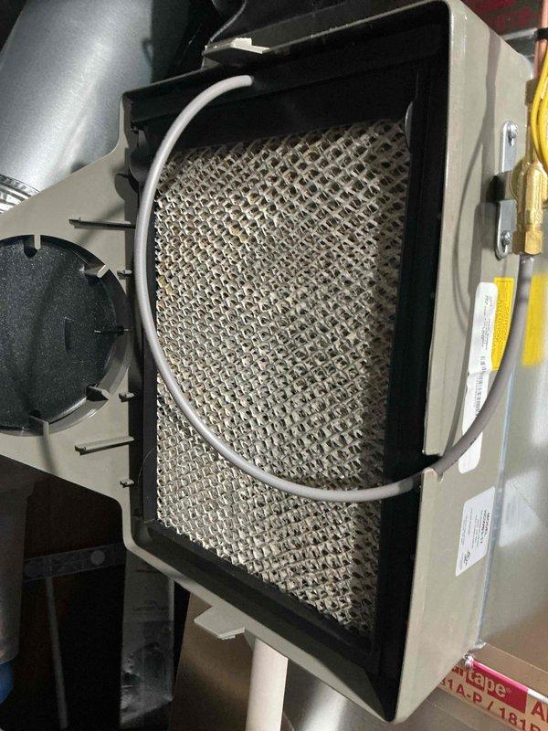 Completed routine annual maintenance on a one-year-old air conditioning system. Performed comprehensive AC tune-up including inspection of all major components, verified system operation and performance parameters using digital multimeter for electrical diagnostics, inspected and documented condition of air filter showing normal dust accumulation for service interval, checked refrigerant levels, tested electrical connections and controls, and confirmed unit is operating within manufacturer specifications. System found to be in good working condition with no issues identified or repairs needed at this time.