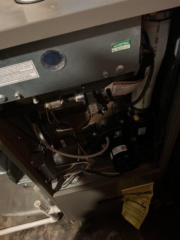 Completed scheduled heating maintenance and tune-up on residential furnace unit under Air Care membership agreement. Performed comprehensive system inspection including verification of all electrical connections, control board operation, and proper wire management throughout the unit. All components found operating within normal parameters, safety systems verified functional, and unit left in proper working condition with documentation photos captured for service records.