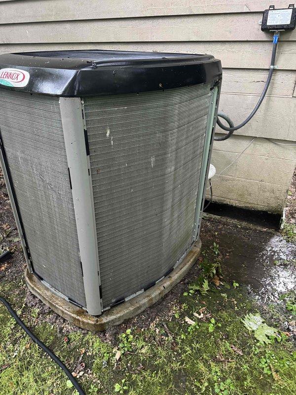 Responded to callback for 7-year-old Lennox AC system with complete failure to operate. Upon arrival, performed diagnostic inspection of outdoor condenser unit and discovered heavy dirt and debris accumulation on condenser coils, significantly restricting airflow and heat transfer capability. Thoroughly cleaned condenser coils to remove caked-on mud and debris buildup. Inspected refrigerant lines, electrical connections, and disconnect switch for proper operation. System restored to normal operating condition with adequate airflow through coils and proper unit startup confirmed.