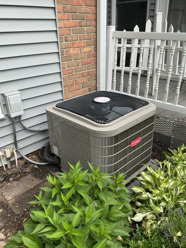 Completed annual cooling maintenance on Bryant air conditioning system. Performed comprehensive inspection of outdoor condensing unit, replaced furnace filter and humidifier pad, verified proper refrigerant levels, checked electrical connections, and confirmed system operation. Unit operating within normal parameters with no issues found.