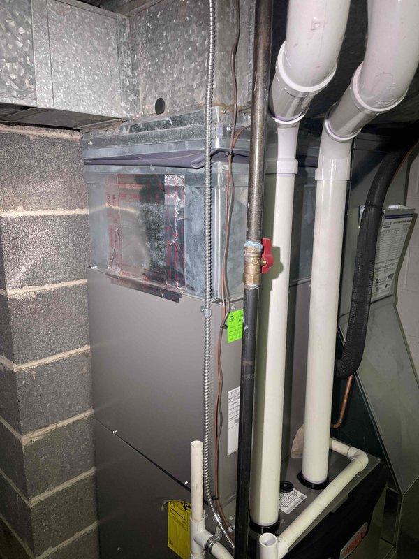 Provided comprehensive estimate for air conditioning system replacement in basement location. Current two-year-old unit is non-operational and requires full replacement. Assessment included evaluation of existing furnace/air handler installation, associated ductwork, drainage systems, and electrical connections to determine specifications for new AC equipment.