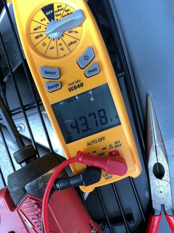 Completed annual cooling maintenance on residential air conditioning system. Performed comprehensive inspection with unit access panel removed, tested electrical components using digital multimeter with readings recorded, and verified proper operation of condenser unit. System found to be functioning within normal parameters with no immediate service needs identified.