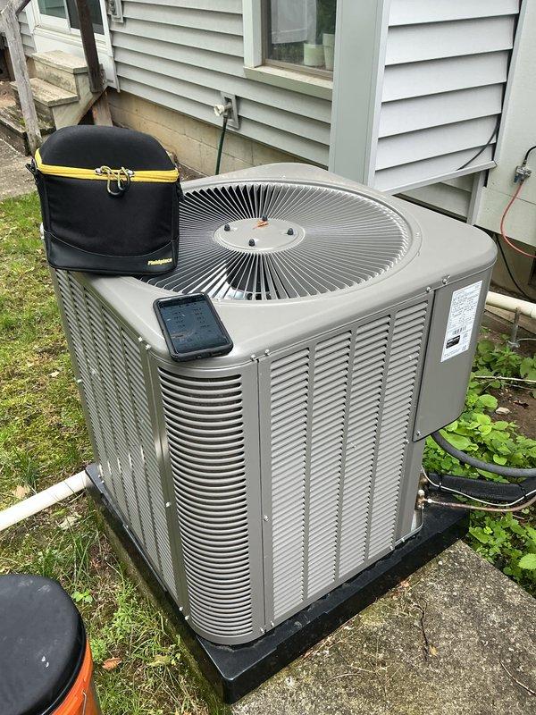Completed annual cooling maintenance on residential split system. Performed comprehensive inspection of indoor air handler unit and outdoor condenser, including evaporator coil examination which showed clean condition with proper fin alignment, verification of refrigerant line connections and insulation integrity, and condensate drain line assessment. All components operating within normal parameters with no deficiencies noted.