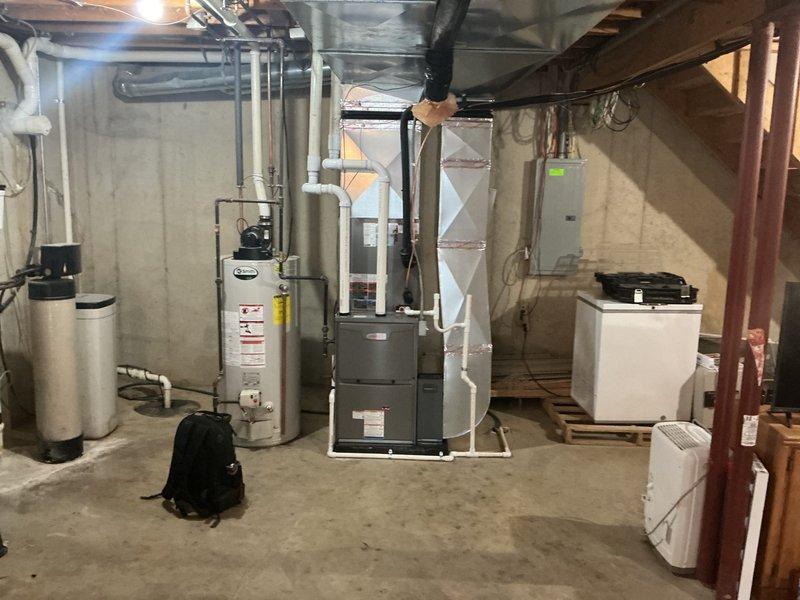 Completed full HVAC system installation including a Lennox 90,000 BTU furnace (Model CK40CT-36C-71) and 3-ton air conditioning unit with left-side configuration in basement mechanical room. All ductwork connections completed, system tested and operational. Permits obtained for mechanical installation prior to work commencement.