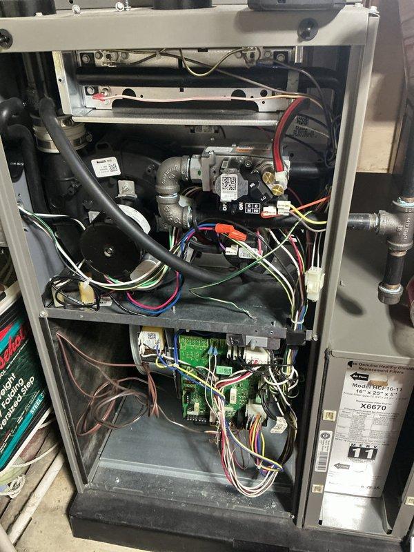Completed annual heating check on HVAC system. Performed comprehensive inspection of evaporative cooler media, which showed normal dust and mineral accumulation consistent with regular operation. Inspected internal components including gas valve assembly, condensate collection system, electrical connections, and control boards. Verified all wiring connections were secure, checked refrigerant lines and insulation integrity, and confirmed proper mounting of all mechanical components. System operational and functioning within normal parameters.