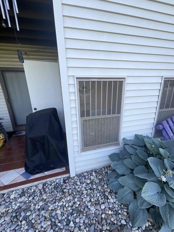 Provided estimate for replacement of 11-year-old non-functional Magic Pak combination furnace and air conditioning unit located in utility closet. Current equipment exhibited extensive rust damage and was no longer operational. Assessed installation requirements including existing ductwork configuration, gas line connections, and through-wall exterior venting for new system replacement.