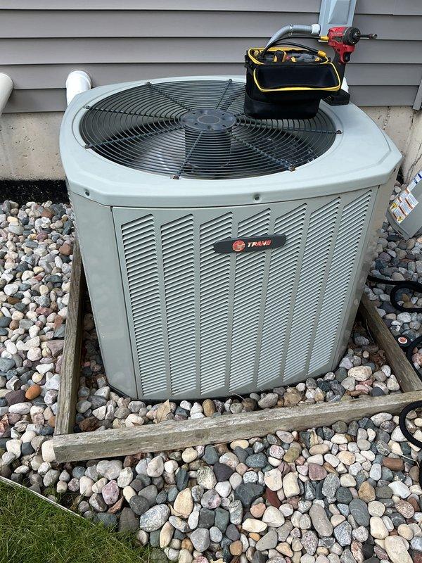 Completed annual cooling maintenance on residential Trane condenser unit. Performed comprehensive system inspection, verified refrigerant charge levels using digital multimeter showing proper subcooling readings at -62°F, checked electrical connections, and confirmed proper fan operation. Unit operating within manufacturer specifications with no deficiencies noted.