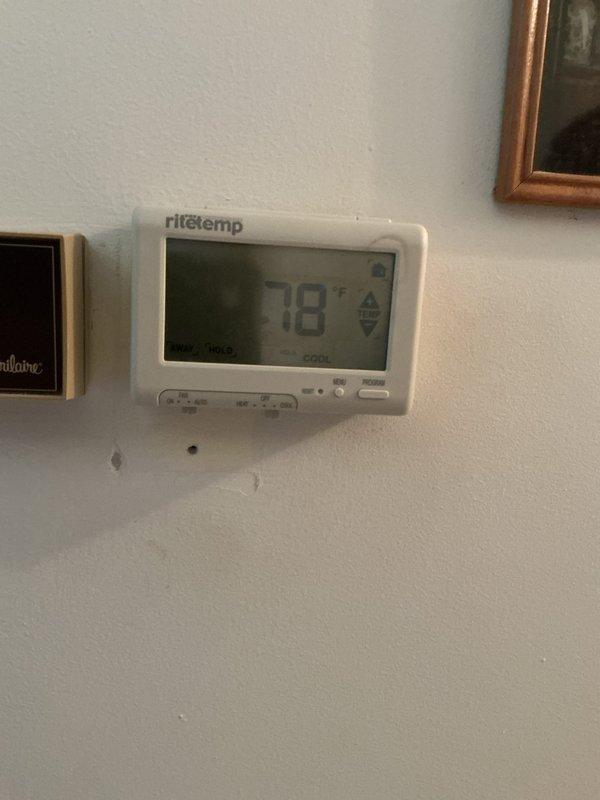 Responded to no-cool call and found 15-year-old Ritetemp thermostat unable to call for cooling due to malfunctioning down arrow button preventing temperature setpoint adjustment below current ambient of 78°F. Replaced failed thermostat with new Sensi programmable unit, verified proper wiring connections, configured system settings, and successfully tested cooling operation with AC unit cycling on at adjusted setpoint of 72°F.