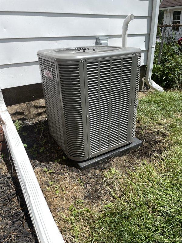 Completed annual HVAC maintenance on residential outdoor condensing unit. Performed standard ACM inspection including visual assessment of unit housing, louvers, fan assembly, and condensate drainage system. Unit found in operational condition with normal weathering consistent with outdoor installation. Documented equipment specifications and current system status with photographic records.