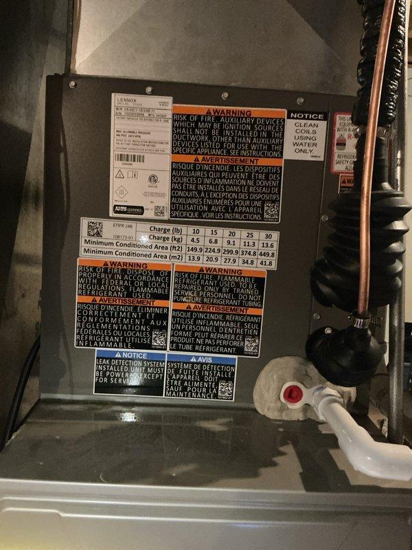 Performed routine air conditioning maintenance on Lennox HVAC system. Inspected air handler unit, verified manufacturer specifications and safety labels, and replaced air filter with new 3M filtration media. System operational and ready for continued service.