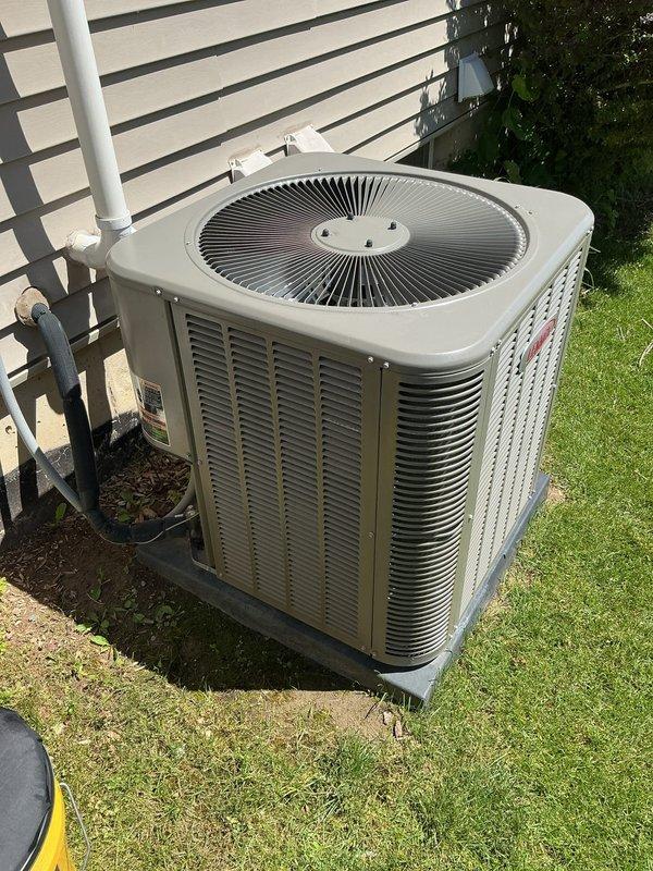 # No Cooling - Residential AC System

Responded to service call for complete system failure on a two-year-old residential air conditioning unit. Upon arrival, performed visual inspection of outdoor condenser unit, which appeared in good physical condition with clean exterior surfaces and proper installation clearance. Unit was positioned on concrete pad with adequate ventilation space and appeared well-maintained.

Conducted diagnostic evaluation of the system to identify cause of no cooling condition. Removed access panels to inspect internal components including burner assembly and heat exchanger. Interior components showed normal aging characteristics for a unit of this age with no visible damage or deterioration. Burner assembly ports and combustion chambers appeared intact with galvanized surfaces showing typical operational wear patterns.

Performed standard troubleshooting procedures including electrical testing, refrigerant pressure checks, and component functionality verificat