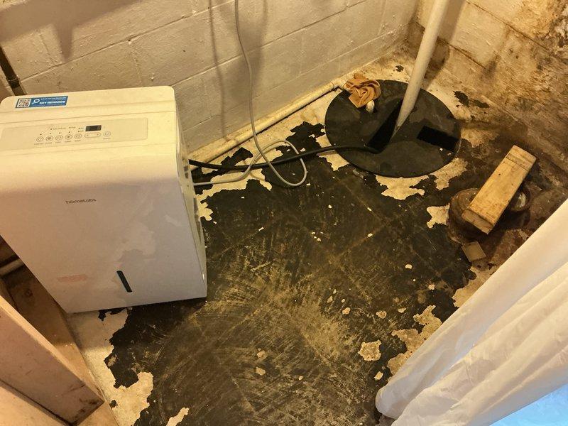 Completed full HVAC system installation including 70,000 BTU furnace, air conditioning unit, humidifier, and water heater in basement utility area. Obtained mechanical permits prior to installation and successfully reconnected all systems to operational status. Addressed water-damaged basement environment by coordinating with dehumidification equipment on-site during installation process.