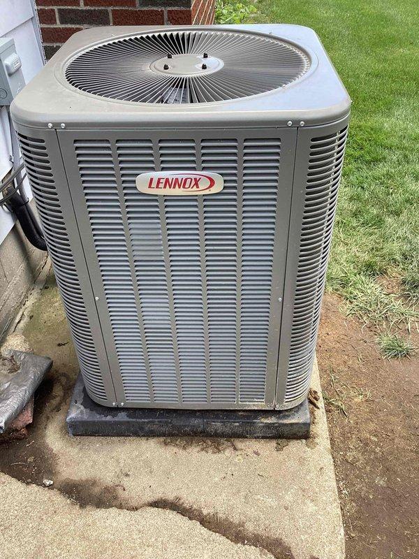 Returned to property under warranty to replace defective condenser coil on Lennox outdoor unit (model 13T40). Removed and replaced coil assembly, evacuated system, and recharged refrigerant to manufacturer specifications. Verified proper operation of condensing unit with all airflow paths clear and unobstructed. System tested and confirmed cooling properly with no leaks detected.
