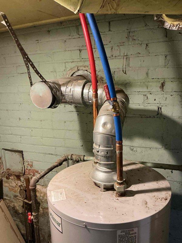 Completed electrical estimate for new whole home generator installation. Assessed existing utility room infrastructure including water heater location, overhead ductwork, electrical conduit routing, and available space for generator placement. Documented current mechanical systems, PVC venting configuration, and HVAC components to determine optimal generator positioning and required electrical service upgrades for seamless integration with home's existing systems.