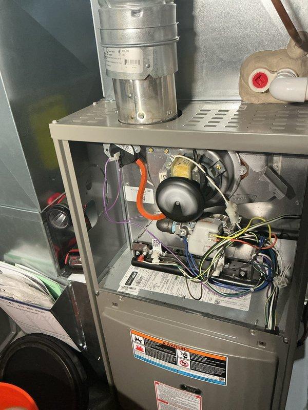 Completed comprehensive maintenance service on 4-year-old Lennox HVAC system including both indoor furnace and outdoor condensing units. Performed full AC tune-up, inspected all internal components including blower motor assembly, pressure switches, control boards, electrical connections, and humidifier system. Cleaned outdoor condenser coils, verified proper refrigerant levels, tested all safety controls and thermostatic operation. System evaluated following previous breakdown incidents reported by customer several months prior. All components found operating within manufacturer specifications, electrical connections secure, and no immediate concerns identified. Unit currently functioning properly with all safety systems operational.